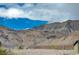 Desert landscaping accentuates the natural beauty of the community's mountain views at 5236 Sunstone Mesa Dr, Las Vegas, NV 89166