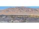 Enjoy panoramic neighborhood vistas with towering mountains, from your home at 5236 Sunstone Mesa Dr, Las Vegas, NV 89166