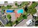 Aerial view of the neighborhood with swimming pools and landscaping at 532 Greenbriar Pl, Boulder City, NV 89005