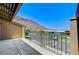 Balcony with mountain views and a black metal railing at 532 Greenbriar Pl, Boulder City, NV 89005