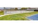 Outdoor basketball court with chain link fencing surrounding the perimeter and mountain views at 532 Greenbriar Pl, Boulder City, NV 89005