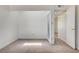 Bright bedroom, with ceiling fan, and an opening leading to another room at 532 Greenbriar Pl, Boulder City, NV 89005