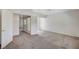 Spacious bedroom with neutral carpet and ceiling fan at 532 Greenbriar Pl, Boulder City, NV 89005