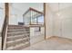 Spacious foyer with soaring ceilings, stairs, and ample closet space at 532 Greenbriar Pl, Boulder City, NV 89005
