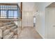 Welcoming foyer with stairs, natural lighting and storage at 532 Greenbriar Pl, Boulder City, NV 89005