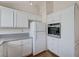 Charming kitchen with classic white cabinets and modern stainless steel oven at 532 Greenbriar Pl, Boulder City, NV 89005