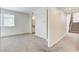 View of the room shows access to the en suite bathroom, large window and access to the stairs at 532 Greenbriar Pl, Boulder City, NV 89005