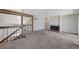 Spacious loft with fireplace featuring railing overlooking the lower level at 532 Greenbriar Pl, Boulder City, NV 89005