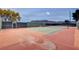 Well-maintained tennis court with a mountain view in the background at 532 Greenbriar Pl, Boulder City, NV 89005