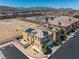 Aerial view of a well-maintained home with solar panels, a landscaped yard, and a private backyard at 5695 Merced St, Las Vegas, NV 89148