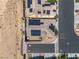 Overhead view of a home equipped with solar panels, complemented by a private backyard and neighborhood at 5695 Merced St, Las Vegas, NV 89148