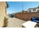 Cozy backyard with modern furniture and low-maintenance landscaping, perfect for outdoor relaxation at 5695 Merced St, Las Vegas, NV 89148