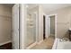Bathroom featuring glass shower, granite counters, and white cabinets at 5695 Merced St, Las Vegas, NV 89148