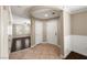 Inviting home entryway featuring tile floors, fresh paint, white trim, and access to the living room at 5695 Merced St, Las Vegas, NV 89148
