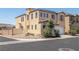 Charming two-story home on a corner lot with landscaped yard and a two-car garage in a desirable community at 5695 Merced St, Las Vegas, NV 89148