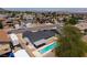 Aerial view of a home featuring an in-ground pool, patio, and desert landscaping in a residential area at 616 Fernbrook Dr, Henderson, NV 89002