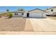 Charming single-story home with desert landscaping and a two-car garage in a quiet neighborhood at 616 Fernbrook Dr, Henderson, NV 89002