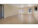 Bright living room with tile flooring and large windows at 616 Fernbrook Dr, Henderson, NV 89002