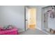 Bright bedroom area with closet, carpet, and inviting decor creating a warm atmosphere at 6337 Canyon Vista Ct, Las Vegas, NV 89156