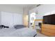 Bedroom featuring ample storage, bright lighting, and a comfortable atmosphere for relaxation and rest at 6337 Canyon Vista Ct, Las Vegas, NV 89156