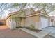Inviting single-story home with a well-maintained front yard and a cozy, welcoming entrance at 6337 Canyon Vista Ct, Las Vegas, NV 89156