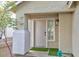 Inviting front entryway with a classic door, a small window, and a well-maintained exterior in a neutral color palette at 6337 Canyon Vista Ct, Las Vegas, NV 89156