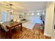 Open-concept living room featuring elegant dining area and natural light at 6699 Oxendale Ave, Las Vegas, NV 89139