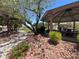 Community park featuring picnic tables under a gazebo, walking path and mature trees at 6699 Oxendale Ave, Las Vegas, NV 89139