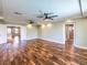 Expansive bedroom features wood floors, recessed lighting, ceiling fans and access to other areas for flexible living at 6779 Goose Watch Ct, Las Vegas, NV 89139