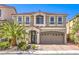 Charming two-story home with a well-maintained lawn and a convenient two-car garage at 6779 Goose Watch Ct, Las Vegas, NV 89139