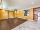 Spacious living room with hardwood floors and stylish wine rack area at 6779 Goose Watch Ct, Las Vegas, NV 89139