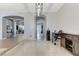 Spacious dining area showcasing elegant archways and views of the living spaces at 6971 Moaning Cavern St, Las Vegas, NV 89131