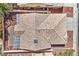Overhead shot of terracotta tile roof with visible AC unit and backyard patio at 7641 Sea Wind Dr, Las Vegas, NV 89128