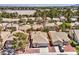 Stunning aerial view of home nestled in a mature, lush neighborhood at 7641 Sea Wind Dr, Las Vegas, NV 89128