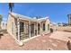 Inviting backyard featuring a covered patio and easy-care landscape design at 7641 Sea Wind Dr, Las Vegas, NV 89128