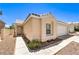 Cozy single-story house featuring low-maintenance landscaping and a welcoming entrance at 7641 Sea Wind Dr, Las Vegas, NV 89128