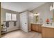 Well-lit bathroom featuring double vanities, modern fixtures, and a neutral color palette at 7805 Leavorite Dr, Las Vegas, NV 89128