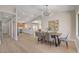Open-concept dining area near a modern kitchen, perfect for entertaining at 7805 Leavorite Dr, Las Vegas, NV 89128