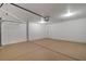 Spacious, clean garage with painted floor and ample room for parking and storage at 7805 Leavorite Dr, Las Vegas, NV 89128