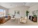 Bright living room with hardwood flooring, vaulted ceilings, and contemporary decor at 7805 Leavorite Dr, Las Vegas, NV 89128