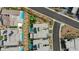 Expansive backyard features a putting green, desert landscaping, and a private pool, all nestled within a modern community at 787 Keyland St, Las Vegas, NV 89138