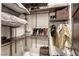 Walk-in closet featuring built-in shelves and rods for organized storage at 787 Keyland St, Las Vegas, NV 89138