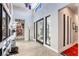 Bright foyer with tall ceilings, contemporary decor, and glass doorway, showcasing an airy and modern aesthetic at 787 Keyland St, Las Vegas, NV 89138