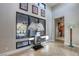 Spacious foyer with high ceilings, modern art, and large windows offering scenic outdoor views at 787 Keyland St, Las Vegas, NV 89138