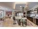 Beautiful kitchen with stainless appliances, a large island, and modern finishes in an open-concept layout and decorative accents at 787 Keyland St, Las Vegas, NV 89138