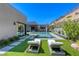 Backyard with pool, spa, lounge chairs and landscaped yard at 787 Keyland St, Las Vegas, NV 89138