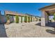 Well-maintained backyard with rock landscaping and privacy wall creates a peaceful outdoor setting at 89 Autumn Day St, Henderson, NV 89012