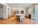 Kitchen with stainless appliances, many cabinets, and a central island at 89 Autumn Day St, Henderson, NV 89012