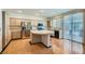 Kitchen with stainless appliances, many cabinets, and a central island at 89 Autumn Day St, Henderson, NV 89012