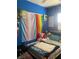 Cozy bedroom featuring colorful decor, comfortable bedding, and a bright, inviting atmosphere at 8913 Cambridge Glen Ct, Las Vegas, NV 89149